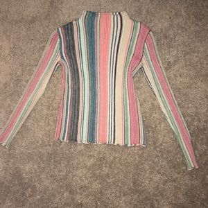 Long sleeve turtleneck sweater.